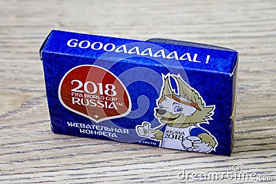 Box with souvenir sweets for the world Cup in Russia in 2008 on wood background. Editorial Stock Photo