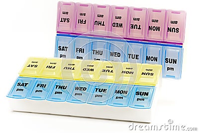 Box for storage of drugs, with inscriptions on days of the week Stock Photo