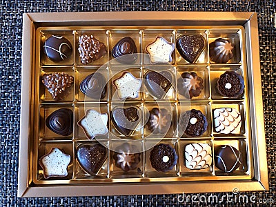 Close-up on chocolates in a box Stock Photo