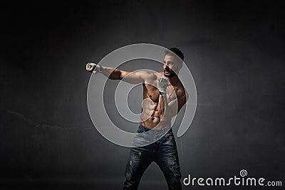 Boxer hit with closing hand Stock Photo