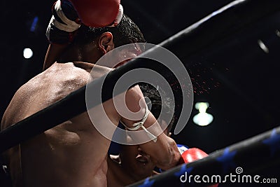 Boxers on the stage fiercely fight Editorial Stock Photo