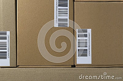 Boxes with barcodes on it.Closeup of parcels ready for delivery Stock Photo