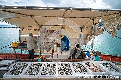 Boxes of freshly caught fish on a fishermen boat Editorial Stock Photo
