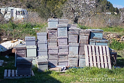 Boxes of honey combs stacked unused Stock Photo