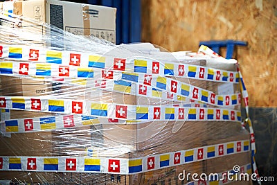 Boxes with humanitarian aid for Ukraine in volunteer centre warehouse Editorial Stock Photo