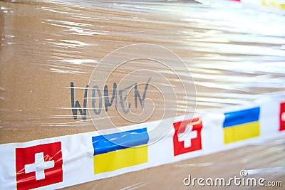 Boxes with humanitarian aid for Ukraine in volunteer centre warehouse Editorial Stock Photo