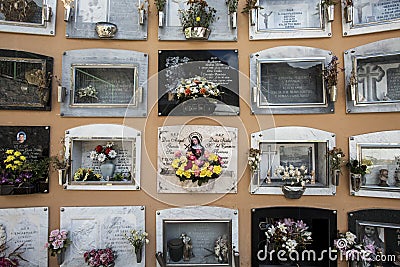 Boxes on the urn in the cemetery Editorial Stock Photo