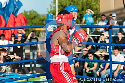 A boxing match Javier Ibanez, Cuba and Malik Bajtleuov, Russia. Defeated Javier Ibanez Editorial Stock Photo