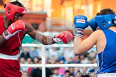 A boxing match between the winner of the World Cup 2014 year in boxing Yordan Hernandes, Cuba, and Daniel Khlebnikov, Russia. Won Editorial Stock Photo