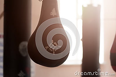 Boxing sand bags hanging at a sports gym Stock Photo