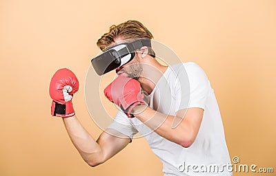 Boxing in virtual reality. Digital sport success. man in VR glasses. Futuristic gaming. vr boxing. future innovation Stock Photo