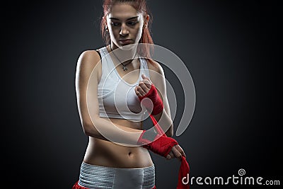 Boxing woman binds the bandage on his hand, before training, detail photo Stock Photo