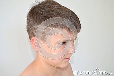 Boy with asymmetrical haircut Stock Photo