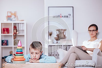 Boy with autism during therapy Stock Photo