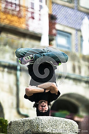 Boy in balance position Stock Photo