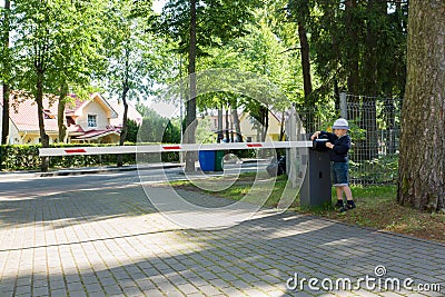 Boy and barrier Stock Photo