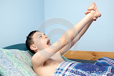 Boy in bed Stock Photo