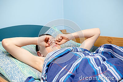 Boy in bed Stock Photo