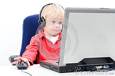 Boy behind a laptop Stock Photo