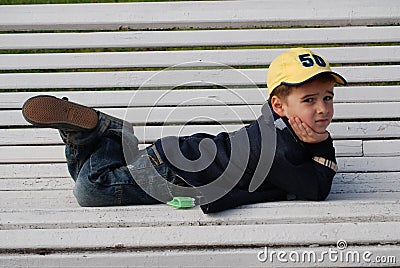 Boy on a Bench Stock Photo