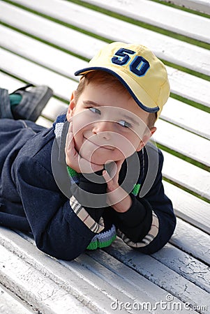Boy on a Bench Stock Photo
