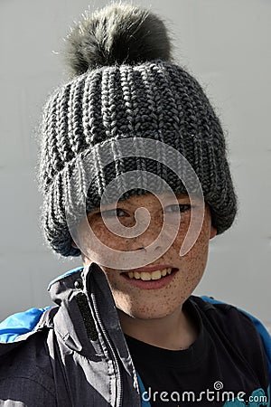 Boy with bobble hat Stock Photo