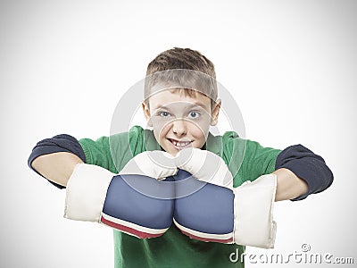Boy with boxing gloves Stock Photo