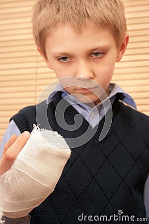 Boy with broken hand. Stock Photo