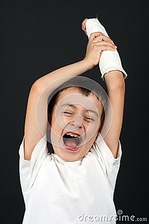 Boy with broken hand in cast Stock Photo