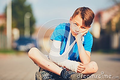 Boy with broken hand Stock Photo