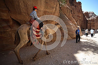 Boy on Camel in Petra, Jordan Editorial Stock Photo