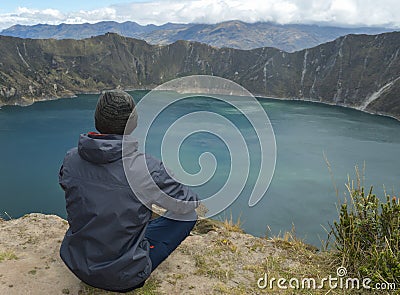 Boy, cap, Quilotoa crater, lagoon, emerald Editorial Stock Photo