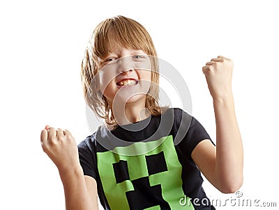 Boy Cheering with his Arms up Stock Photo