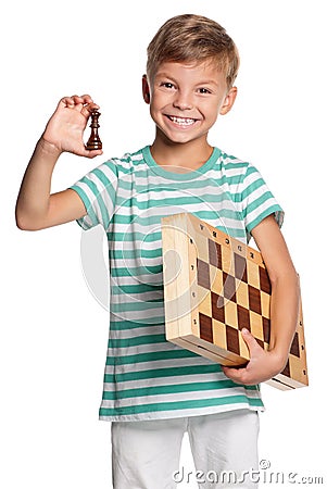 Boy with chessboard Stock Photo