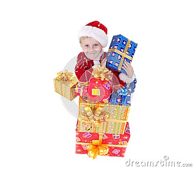 Boy in christmas clothes with toys Stock Photo