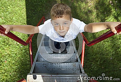 Boy climbing Stock Photo