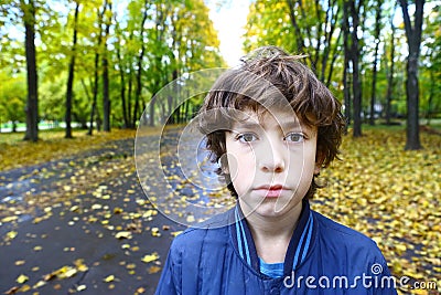 Boy close up outdoor sad unhappy portrait Stock Photo