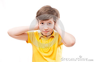 The boy closes the ears Stock Photo
