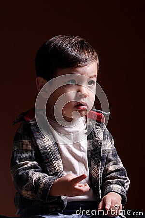 Boy counts with his fingers. Stock Photo