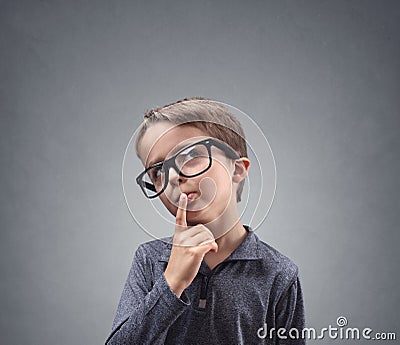 Boy deep in thought Stock Photo