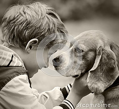 Boy and dog black and white portrait Stock Photo