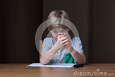 Boy doing paper ball Stock Photo