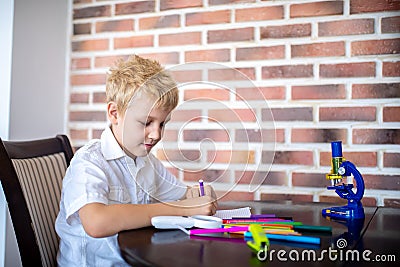 Boy draws with markers Stock Photo