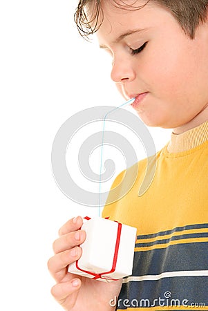 Boy drinks from gift through tubule Stock Photo