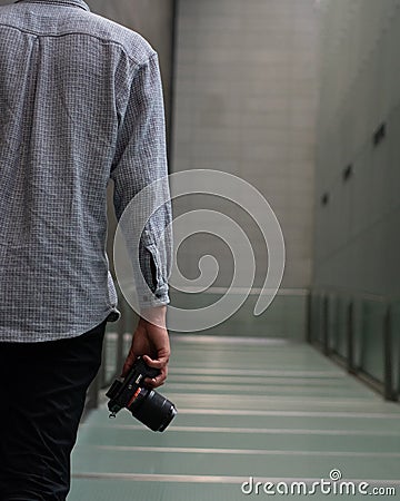 Photographer in a Hallway Stock Photo