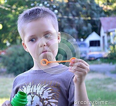 Boy expression quizzical surprised incredulous Stock Photo