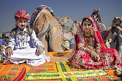 Boy and girl dressed as prince and princess at Desert Festival in Rajasthan Editorial Stock Photo
