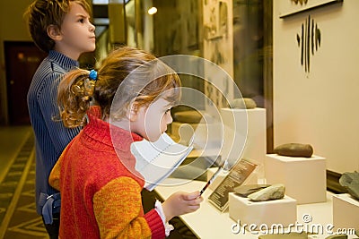 Boy and girl at excursion in historical museum Editorial Stock Photo