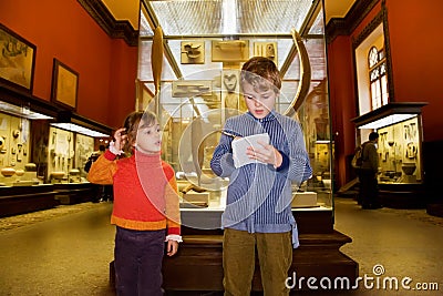 Boy and girl at excursion in historical museum Editorial Stock Photo