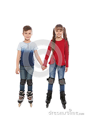 Boy and girl with inline roller skates Stock Photo